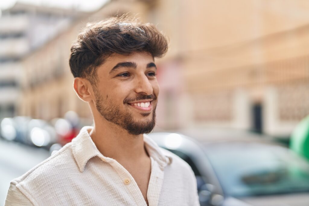 Young Man Smiling Outdoors
